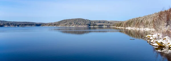 Winter scenery with mountain forests and water reservoir — Stock Photo, Image