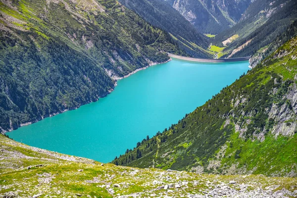 Beautiful alpine walley with azure blue water dam — Stock Photo, Image