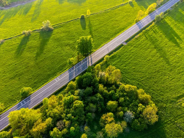 Straight Asphalt Road Green Meadows Sunset Time Aerial View Drone — 图库照片