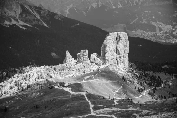 Five Towers, Italian: Cinque Torri di Averau, impressive rock formation near Cortina d Ampezzo, Dolomites, Italy. Black and white image.