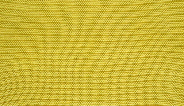 带花纹的光滑针织黄色毛衣的质地 手工针织羊毛或棉织物的质地 针织图案的背景 — 图库照片