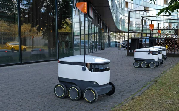 Autonomous delivery robot on Tallinn, Estonia. Estonian company developing autonomous delivery vehicles. Concept of future, technology, unmanned courier robot.