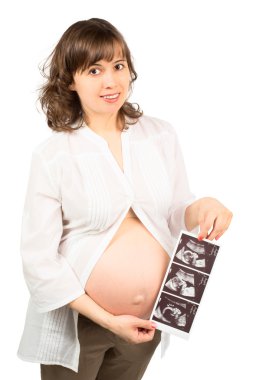 hamile kadın bir ultrason görüntüsü gösteriliyor