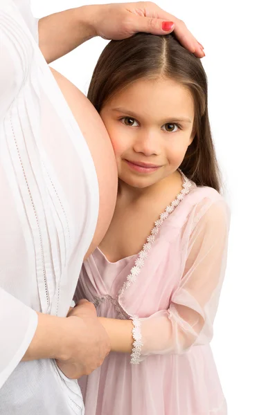 Younge Mädchen mit schwangerer Mutter — Stockfoto