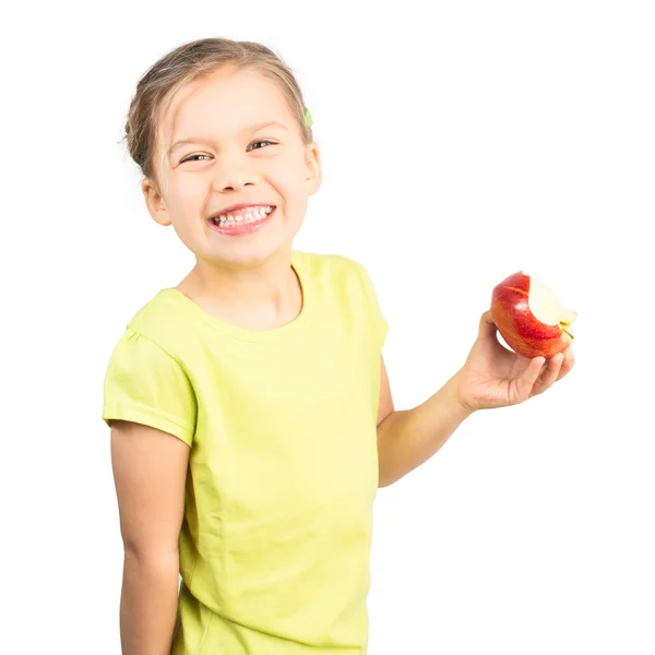 Jong meisje eten appel — Stockfoto