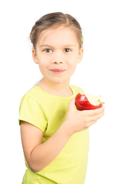 Ung flicka äter äpple — Stockfoto