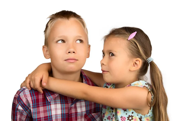 Little Girl Hugs her Older Brother — Stock Photo, Image