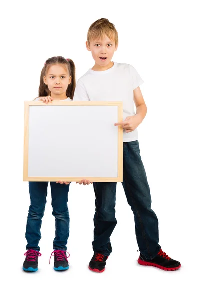 Chlapec a dívka s rámečkem — Stock fotografie