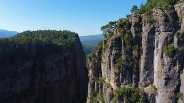 Tazi Canyon in Turkey on Sunny Morning. Aerial View. Drone Flies Forward and Upwards over the Cliff