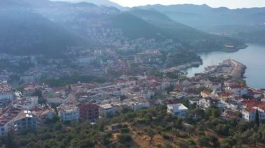 Kas Town, Sea and Mountains on Sunny Day. Antalya, Turkey. Aerial View. Orbiting
