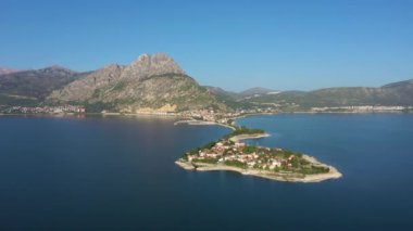 Egirdir Town, Lake and Mountains in Turkey on Sunny Day. Aerial View. Drone Flies Forward.