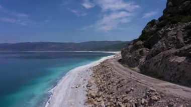 Lake Salda Coastline on Sunny Day. Crater Lake. Burdur Province, Turkey. Aerial View. Turkish Maldives. Drone Flies Forward and Upwards