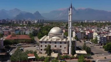 White Mosque, Cityscape and Mountains. Antalya Turkey. Aerial View. Orbiting