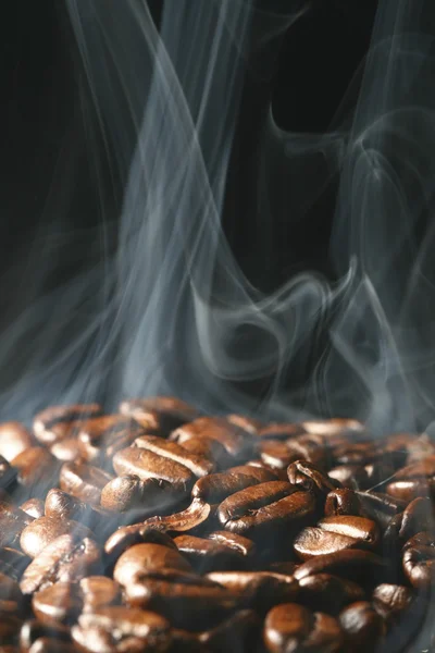 Macro coffee beans in aroma smoke — Stock Photo, Image