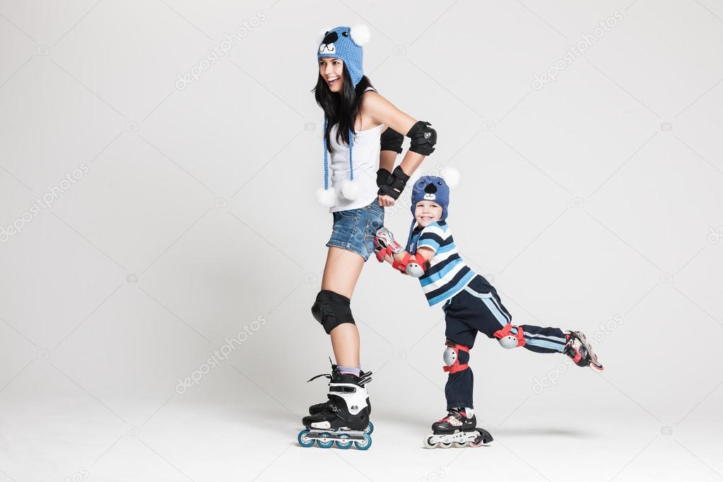 Mother and son in roller skates