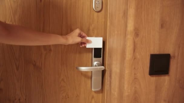 Woman open door digital lock with card key — Stock Video