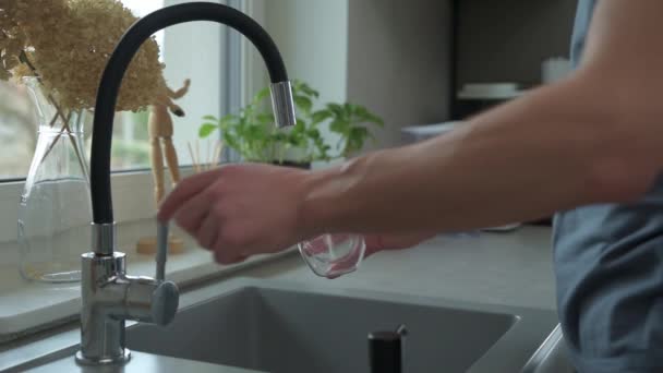 Man Pouring Water Faucet Glass Kitchen Sink — Stock Video