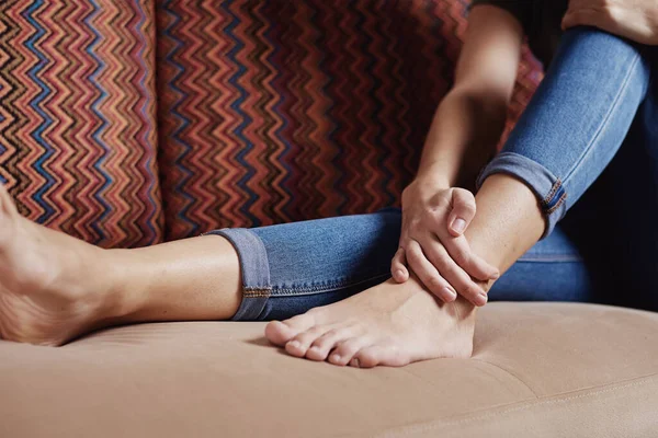Woman have pain in leg, take ankle massage — Stock Photo, Image