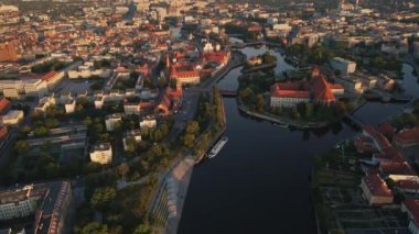 Aerial view of Wroclaw city panorama, Poland. Cityscape of Wroclaw with Odra river view and historical architecture buildings, City life at sunrise
