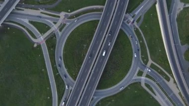 Top view of cars driving on round intersection in city, Transportation roundabout infrastructure, Highway road junction in Wroclaw, Poland