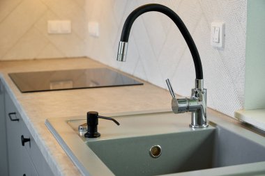 Modern kitchen with sink, Empty kitchen background with wooden countertop and cabinets