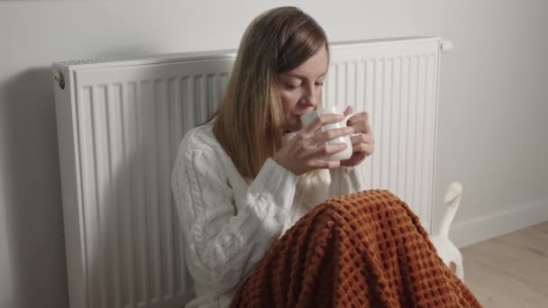 Worried Sad Woman Sits Blanket Heating Radiator Cup Tea Rising — Stock video