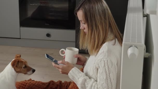 Worried Sad Woman Sits Blanket Heating Radiator Use Smartphone Rising — Stock videók