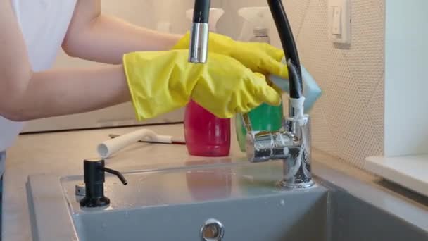 Woman Yellow Glowes Cleaning Water Tap Sink Kitchen Daily Chores — Stockvideo