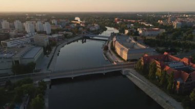 Aerial view of Wroclaw city panorama with Grunwaldzki bridge, Poland. Cityscape of Wroclaw with Odra river view and historical architecture buildings, City life at sunrise