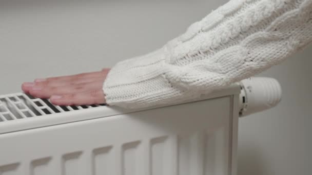 Woman Adjusting Temperature Heating Radiator Energy Crisis Concept Europe Rising — Stockvideo