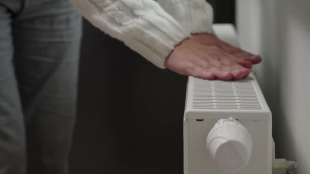 Woman Adjusting Temperature Heating Radiator Energy Crisis Concept Europe Rising — Stockvideo