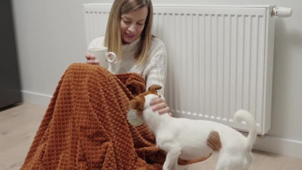 Worried Sad Woman Her Dog Sits Blanket Heating Radiator Use — Stock video