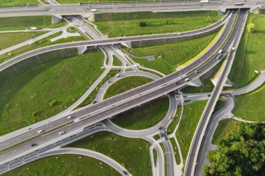 Top view of cars driving on round intersection in city, Transportation roundabout infrastructure, Highway road junction in Wroclaw, Poland