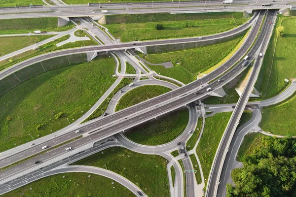 Top view of cars driving on round intersection in city, Transportation roundabout infrastructure, Highway road junction in Wroclaw, Poland