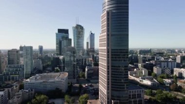 Warsaw city panorama, Aerial view of cityscape with modern skyscrapers. Warsaw, Poland - September 3, 2022