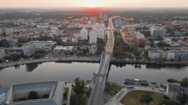 Aerial view of Wroclaw city panorama with Grunwaldzki bridge, Poland. Cityscape of Wroclaw with Odra river view and historical architecture buildings, City life at sunrise