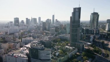 Warsaw city panorama, Aerial view of cityscape with modern skyscrapers. Warsaw, Poland - September 3, 2022