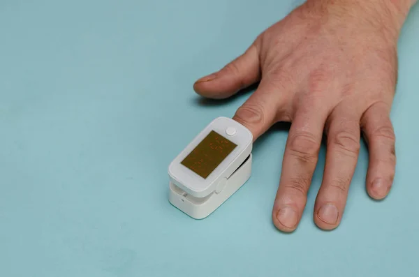 Man Hand Oximeter His Index Finger Mature Man Measures Capillary — Stock Photo, Image