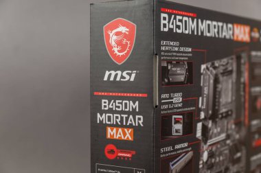 Gri bir arka planda MSI B450 MAX ana kartı. Yeni bilgisayar donanımlı kara kutu. Modern dijital teknoloji. Ukrayna, Nikolaev - 02 09 2022