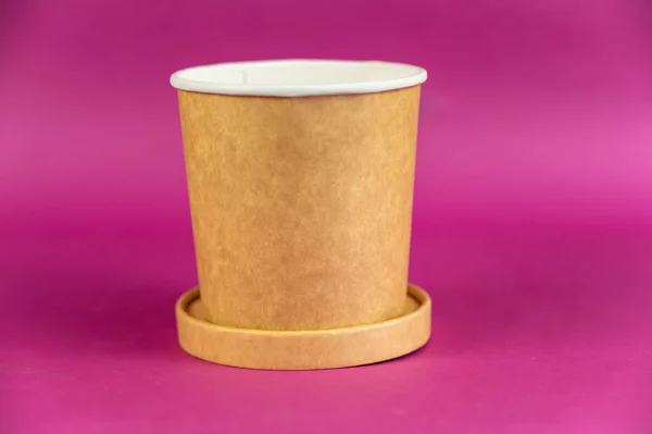 蓋の反対色の背景を持つ空の円筒形の紙容器 スープ アイスクリーム その他の食品用の茶色の食品容器 — ストック写真