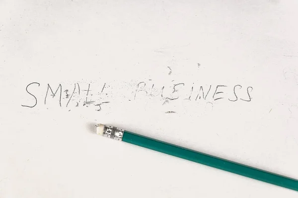 Half Rubbed Eraser Inscription Small Business Handwritten Text White Paper — 스톡 사진