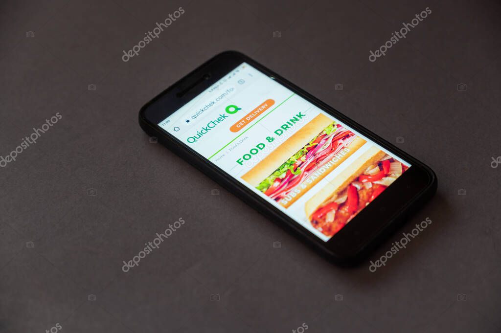 QuickChek website on your smartphone screen. QuickChek is a chain of mini-markets based in Whitehouse Station, New Jersey, and New York City. Mykolaiv, Ukraine - 06 26 2022