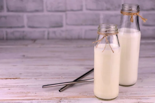 Two Bottles Milk White Wooden Background Copy Space — Stockfoto