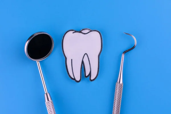 Tooth Dentist Tool Blue Background — Stock Photo, Image