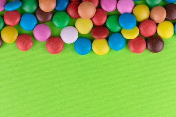 Multi Colored Candies Green Background Copy Space — Stock Photo, Image