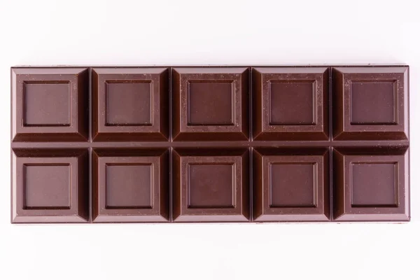 Barra Chocolate Escuro Isolado Branco Vista Superior — Fotografia de Stock