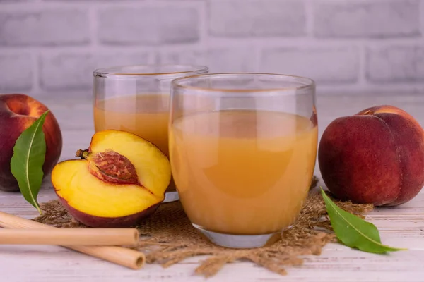 Peach Juice Glasses White Wooden Background — Stock Photo, Image