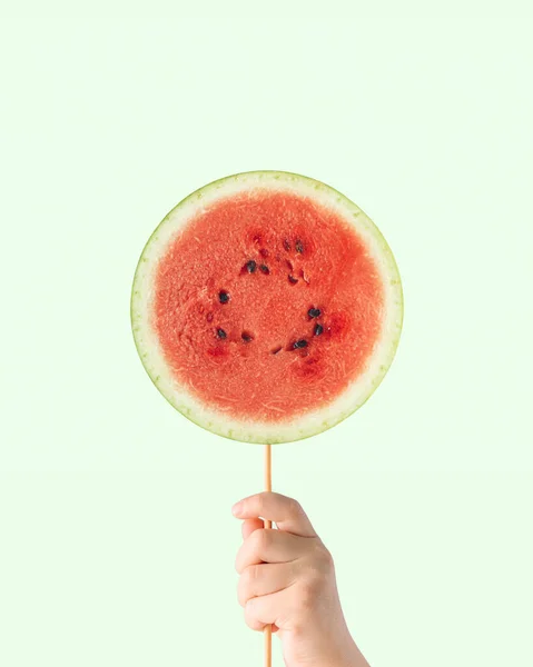 Barns Hand Hålla Stick Med Vattenmelon Skiva Isolerade Ljus Pastell — Stockfoto
