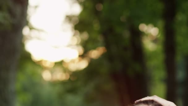 Pretty Girl Stretching Neck Before Training in Nature. — Stock Video