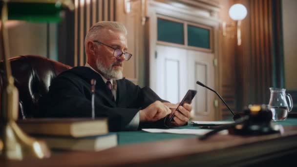 Courtroom Judge Using Smartphone — Stock Video